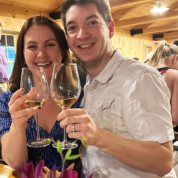Couple enjoying wine at Rolling Hills dinner