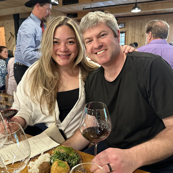 Couple enjoying wine tasting event at Rolling Hills